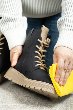 Shoe Care, Woman Wiping Cloth Surface Of Leather Shoeの写真素材