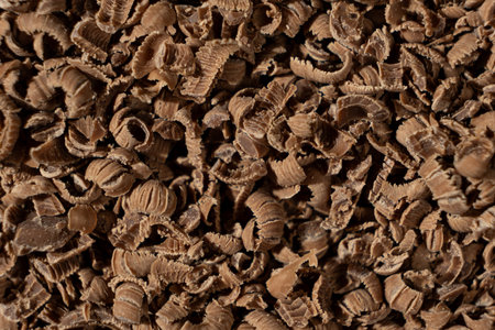 Grated natural organic chocolate shavings macro.