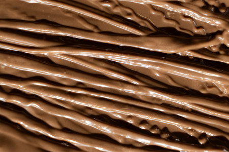 Macro Texture Natural Melted Milk Chocolate Top View.の写真素材