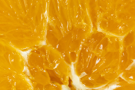 Macro Texture Of Ripe Fresh Orange Fruit Pulp