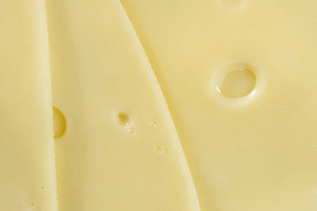 Delicate Semi-Hard Cheese Slices with Holes.