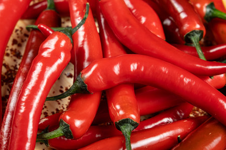 Close-up top view of red chili peppers.の写真素材