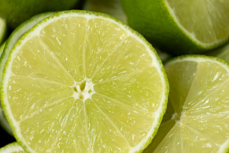 Juicy Green Lime Halves in Macro View Top Viewの写真素材
