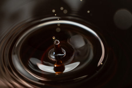 Black Brown Drop of Soy Sauce Close Focusの写真素材