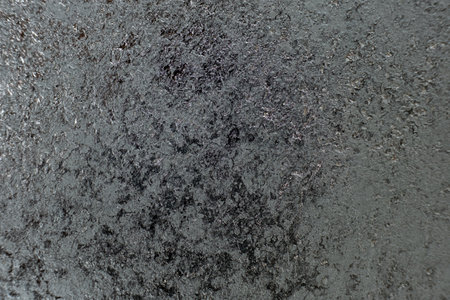 Abstract Black Gray Dark Background Macro Texture Cast Iron.の写真素材