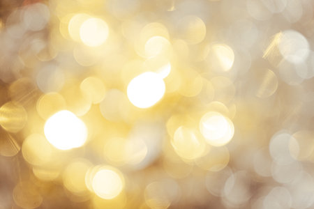 Golden Holiday Lights Blurred for Seasonal Sales.の写真素材