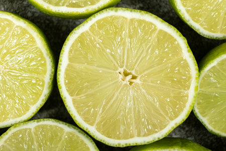 Juicy Green Lime Halves in Macro View Top View.