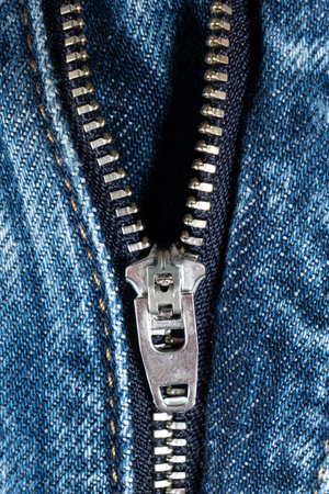 Detailed View of Jeans Zipper and Denim Fabric.の写真素材