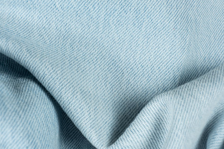 Wavy Pattern of Blue Jean Fabric. Close-Up Textured.の写真素材