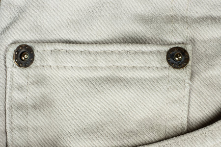 Macro Texture Beige Natural Denim. Metal Denim Tack Button.の写真素材