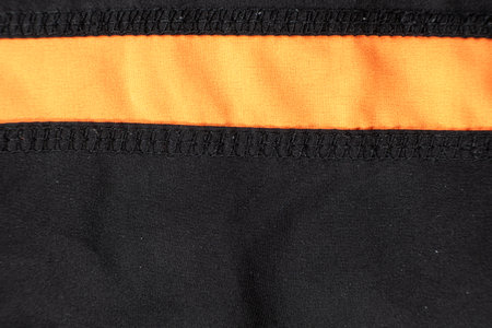 Old worn-out polyester and elastane fabric, pilling and frayed threads.の写真素材