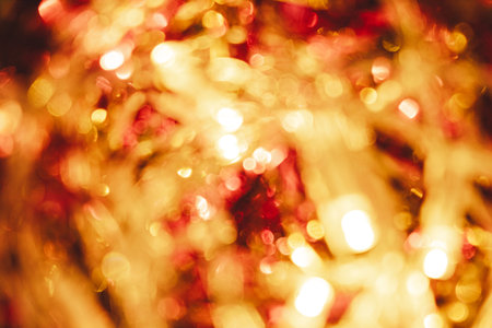 Golden Holiday Lights Blurred for Seasonal Sales.の写真素材