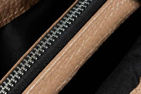 Metal zipper on the inside pocket of the leather bagの写真素材
