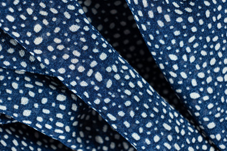 Close-Up of Polka Dot Polyester Fabric.の写真素材
