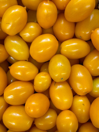 Fresh Yellow Plum Tomatoes Backgroundの写真素材