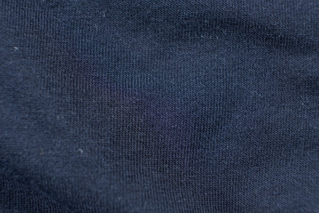 Close-Up of Old Cotton Elastane Fabric with Pilling Texture.の写真素材