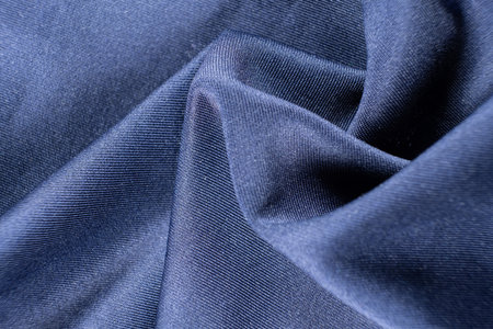 Rich blue fabric macro background.の写真素材