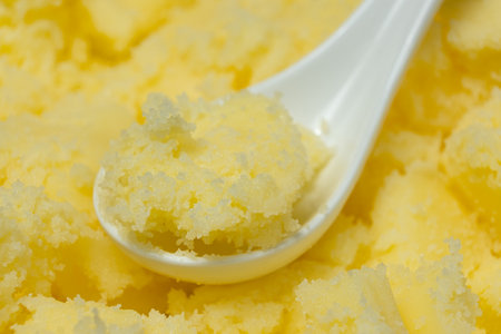 Natural Indian Traditional Ghee Butter Clarified Butter In Spoon Close-Up.の写真素材