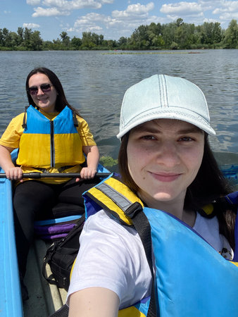 Kayaking on the river, vertical selfie, outdoor activities.の写真素材