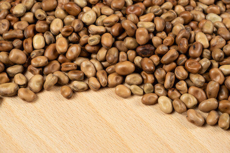 Horse Garden Beans Vicia Faba on Wooden Background.