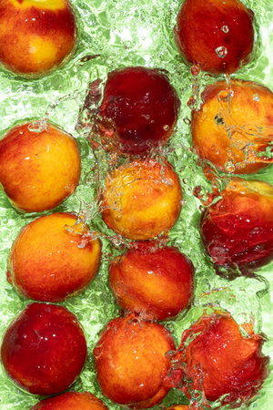 Fresh Peaches in Water. Top View Composition with Water Movementの写真素材