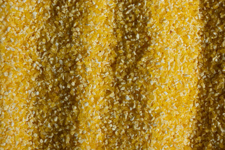 Abstract Yellow Cooking Corn Grits Background