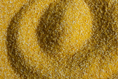 Abstract Yellow Cooking Corn Grits Background