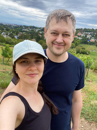 Selfie of a happy married couple of millennials walking in natureの写真素材