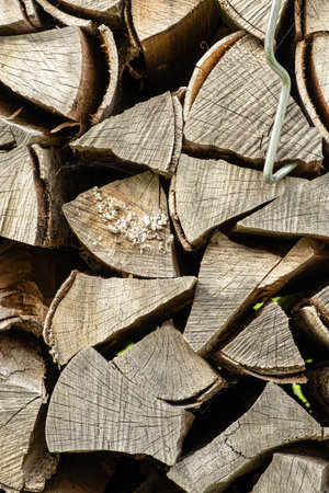 Texture of Firewood Prepared for Stove Heating, Natural Abstract Brown Background.の写真素材