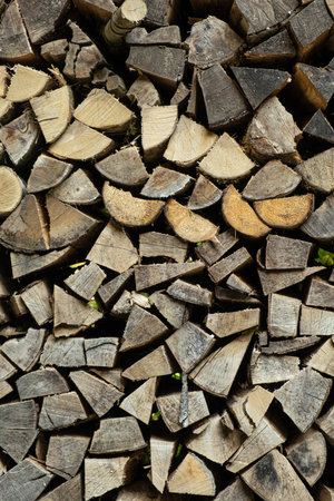 Texture of Firewood Prepared for Stove Heating, Natural Abstract Brown Background.