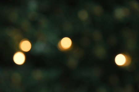 Festive Christmas Bokeh Background with Golden Lights.の写真素材
