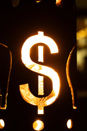 Money and Inflation Concept. Burning Cash Symbolism in a Fire Pit.の写真素材
