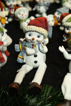 Cute Ceramic Snowmen Figurines at Vienna Christmas Market. December 20, 2025, Vienna, Austria.のeditorial素材