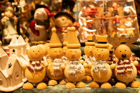 Lots of handmade wooden snowmen toys. December 20, 2025, Vienna, Austria.のeditorial素材