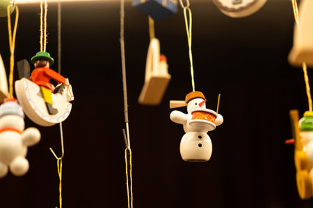 Handmade wooden snowmen figures Christmas tree decorations.