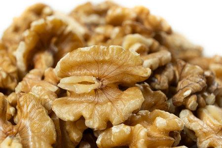 Group of organic walnut halves healthy snack on white background.の写真素材