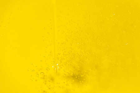 Unrefined Vegetable Oil Flowing, Macro Texture, Oil Flow.の写真素材