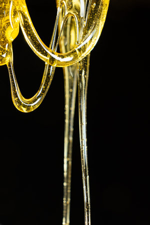 Creative honey swirl on black background