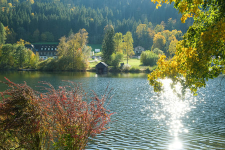 Beautiful mountain landscape with lake in early autumnの写真素材