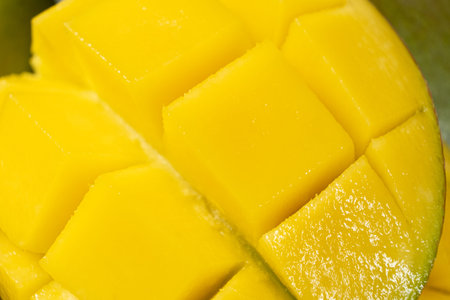 Juicy mango halves with cube cut pattern