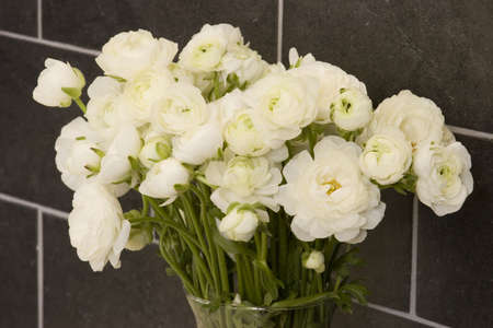 Peony flowers in an arrangement of flowers.
