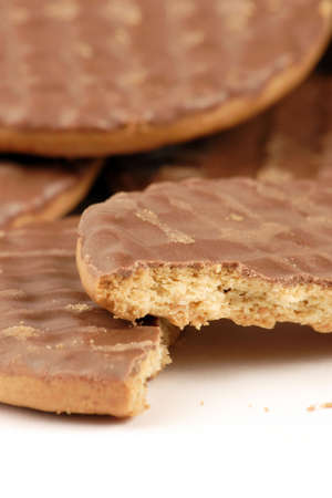 Chocolate biscuits against a plain white Background.