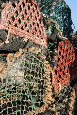 Lobster pots on the dockside at Seaton, Devon.