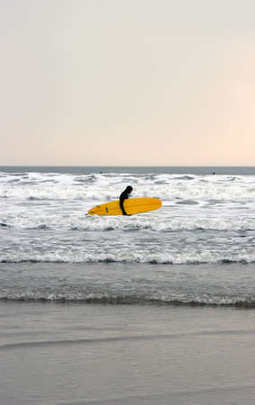 A Surfer at Croyde, Devon.の写真素材