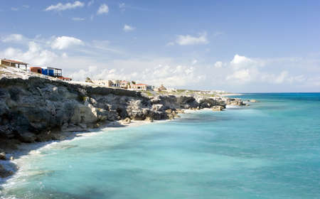 Rocks and waves in Isla Mujeres, Mexico.の写真素材