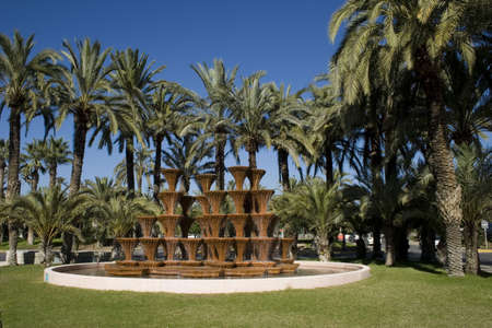 Palm Trees and waterfall in Elche Murcia, Spain.の写真素材