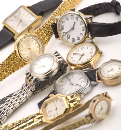 Multiple Wrist watches isolated on a white background.の写真素材