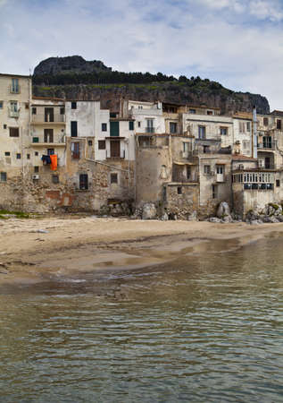 A seascape of the historic town of cefalu in Sicily の写真素材