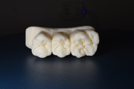 carved tooth on soap by dental assistantの写真素材
