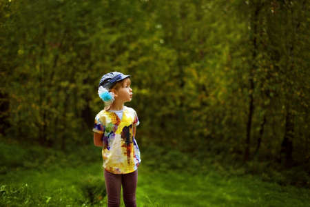 The girl in the woods communicating with natureの写真素材